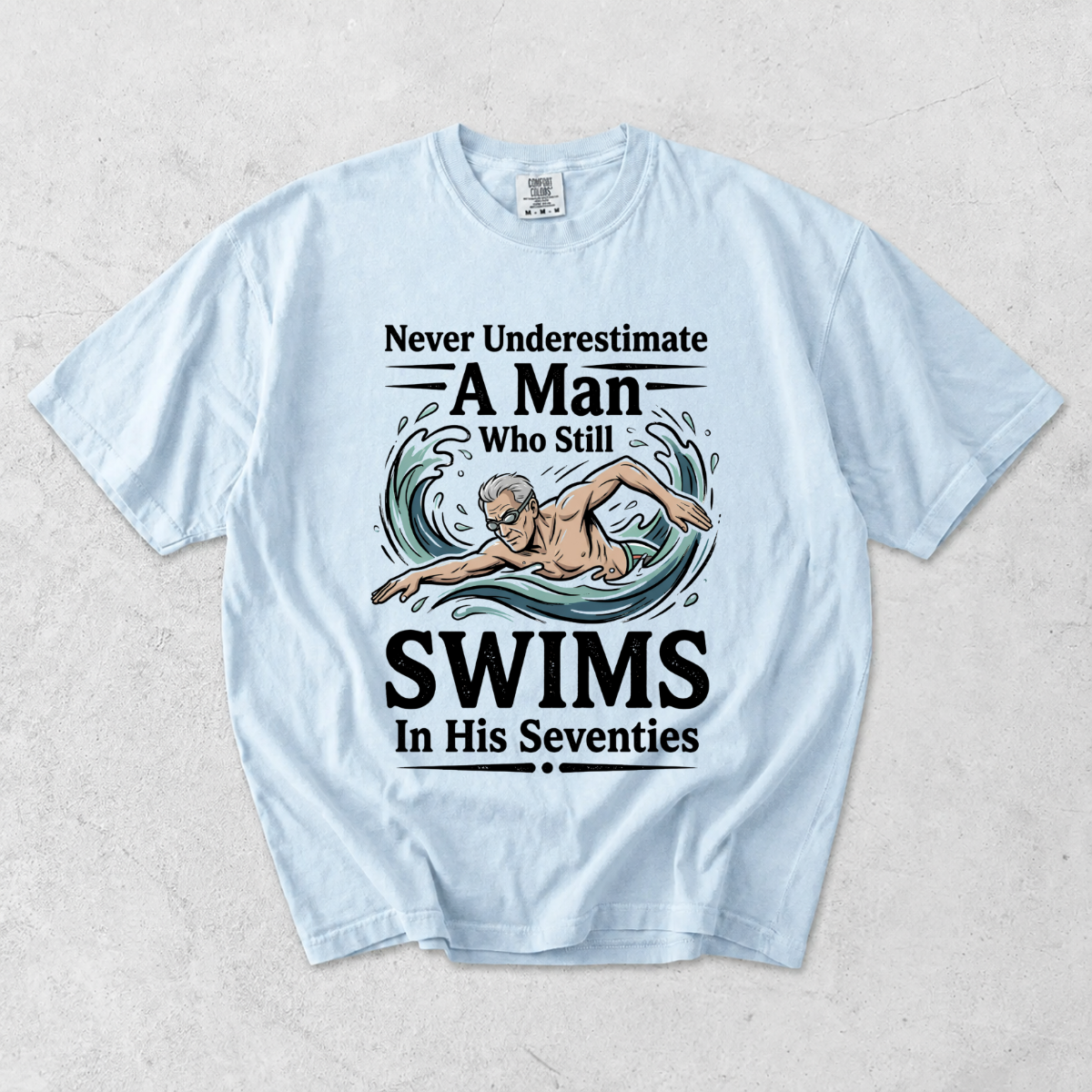 Never Underestimate A Man Who Still Swims In His Seventies T-Shirt